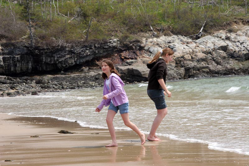Chesley and Geralyn playing in the ocean