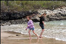 Chesley and Geralyn playing in the ocean