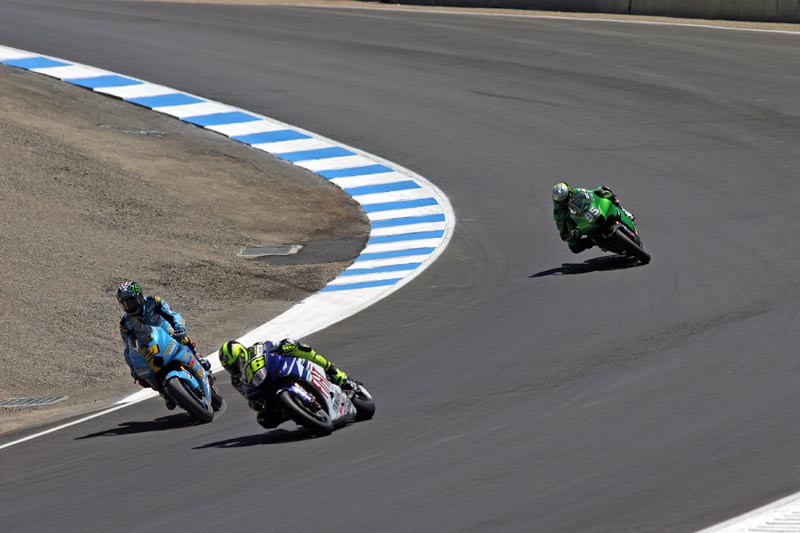 ...Who then almost t-bones Rossi getting back on the track!