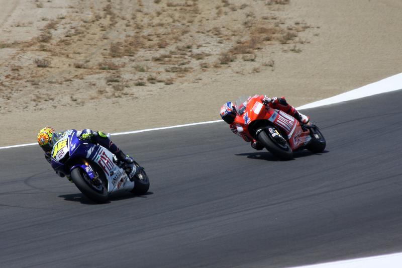 MG8_6130.jpg - Rossi leads Stoner again. I think Stoner pitched it on this lap